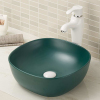 Lavabo de baño de porcelana vítrea sin rebosadero